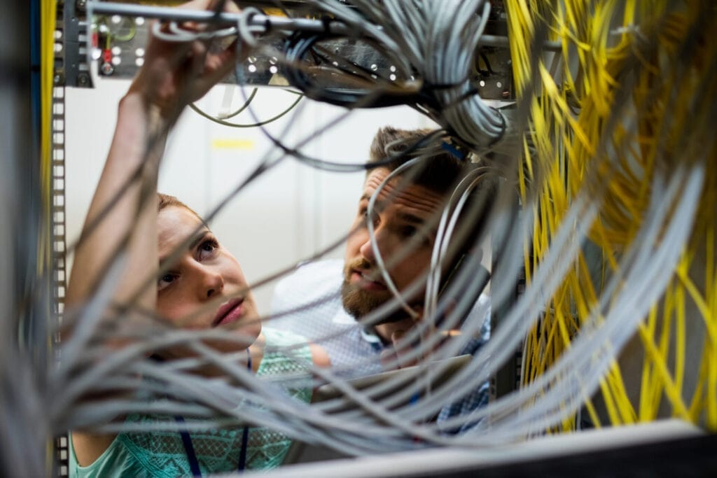 Technicians fixing cable